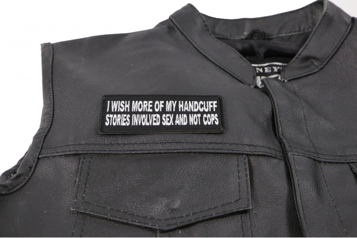 I Wish More of My Handcuff Stories Involved Sex and Not Cops Patch - 4x1.5 inch. Embroidered Iron on Patch shown on leather vest