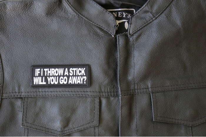 If I throw a Stick will you go away Patch, Biker Sayings shown on leather vest