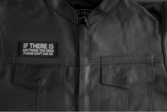 If There Is Anything You Need Please Don't Ask Me Patch shown on leather vest