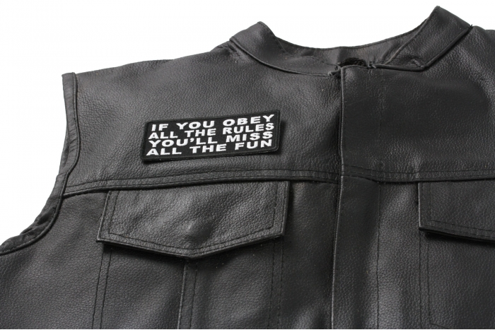If You Obey All The Rules You'll Miss All The Fun Patch - 4x1.5 inch. Embroidered Iron on Patch shown on leather vest