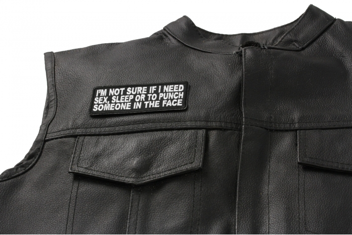 I'm Not Sure If I Need Sex Sleep or To Punch Someone In The Face Patch - 4x1.5 inch. Embroidered Iron on Patch shown on leather vest