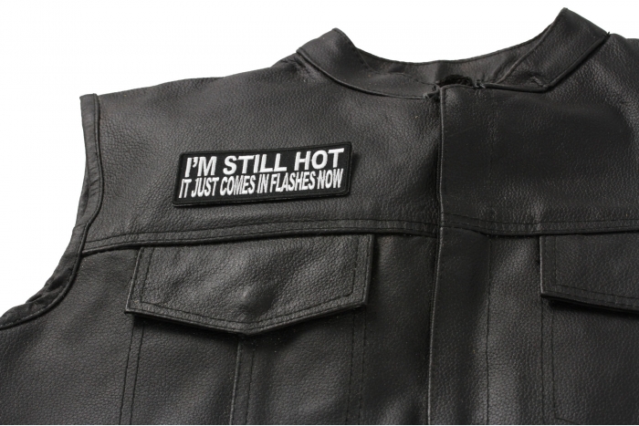 I'm Still Hot It Just Comes In Flashes Patch - 4x1.5 inch shown on leather vest