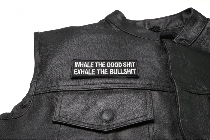 Inhale The Good Shit Exhale The Bullshit Patch - 4x1.5 inch. Embroidered Iron on Patch shown on leather vest