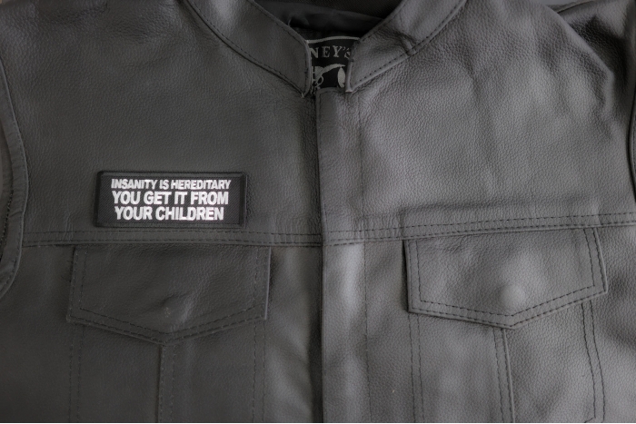 Insanity Is Hereditary You Get It From Your Children Patch shown on leather vest