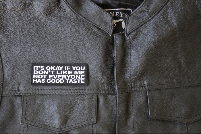 It's Okay if You Don't Like me Not Everyone Has Good Taste Patch - 4x1.5 inch - Embroidered Iron on Patch shown on leather vest