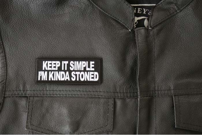 Keep It Simple I'm Kinda Stoned Patch - 4x1.5 inch - Embroidered Iron on Patch shown on leather vest