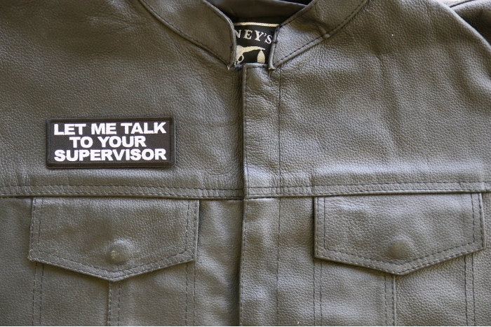 Let me Talk to your Supervisor Patch, Funny Saying Patches shown on leather vest