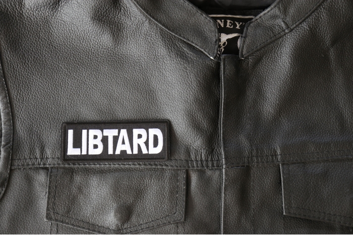 Libtard Patch - 4x1.5 inch, Funny Saying Patches shown on leather vest