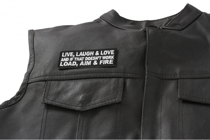 Live Laugh Love and If That Doesn't Work Load Aim and Fire Patch - 4x1.5 inch. Embroidered Iron on Patch shown on leather vest