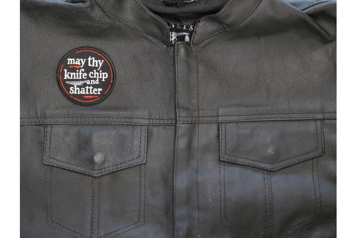 May thy knife chip and shatter Patch shown on leather vest