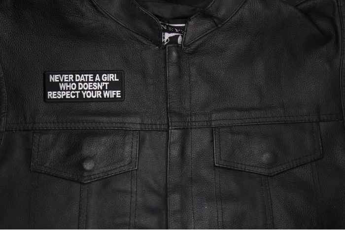 Never Date a Girl Who Doesn't Respect Your Wife Patch shown on leather vest