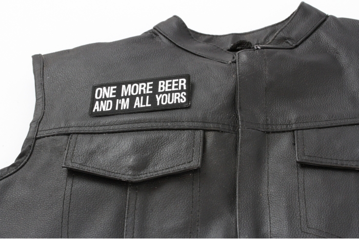 One More Beer and I'm All Yours Patch - 4x1.75 inch. Embroidered Iron on Patch shown on leather vest