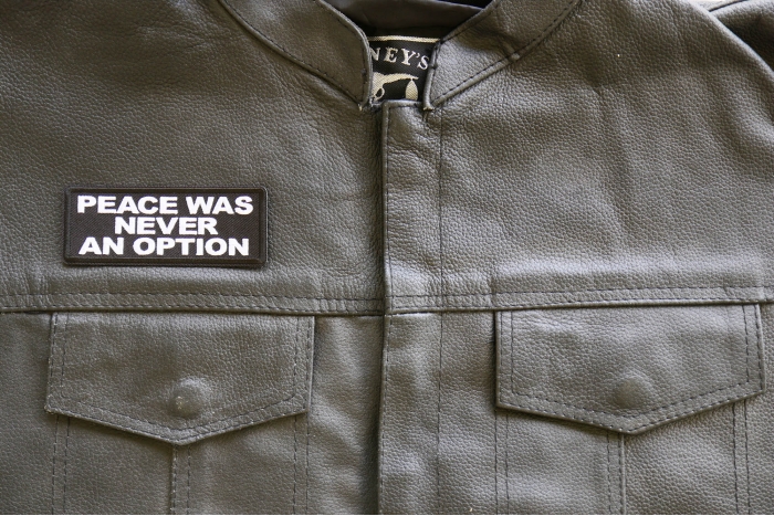 Peace Was Never an Option Patch, Military Saying Patches shown on leather vest