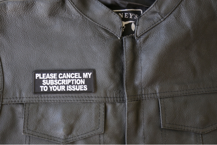 Please Cancel My Subscription to your Issues Patch - 4x1.5 inch - Embroidered Iron on Patch shown on leather vest