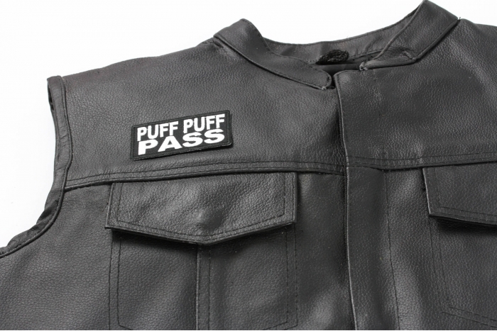 Puff Puff Pass Patch - 3x1.5 inch. Embroidered Iron on Patch shown on leather vest