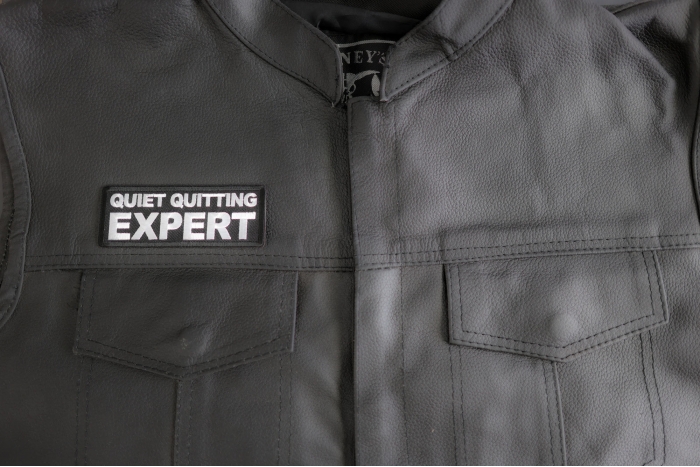 Quiet Quitting Expert Patch shown on leather vest