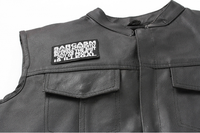 Sarcasm Because Beating Up People Is Illegal Patch - 3.5x2 inch. Embroidered Iron on Patch shown on leather vest