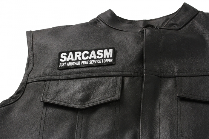 Sarcasm Just Another Service I Offer Patch - 4x1.5 inch. Embroidered Iron on Patch shown on leather vest