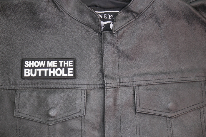 Show me The Butthole Patch shown on leather vest