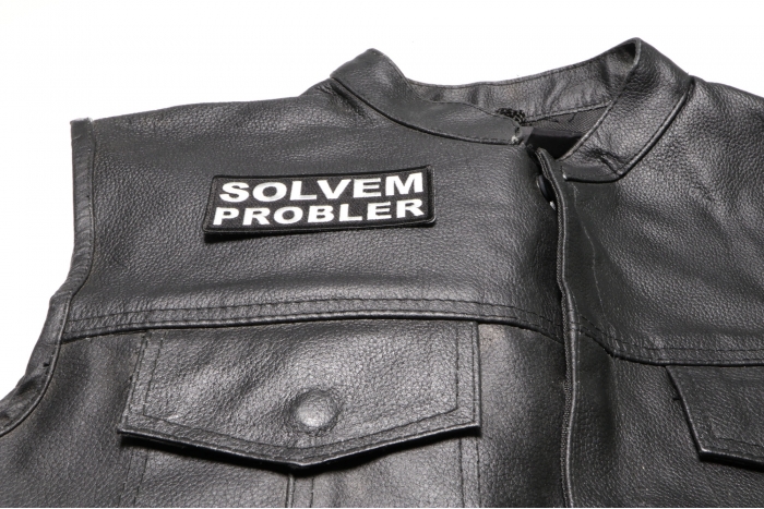 Solvem Probler Patch - 4x1.5 inch. Embroidered Iron on Patch shown on leather vest