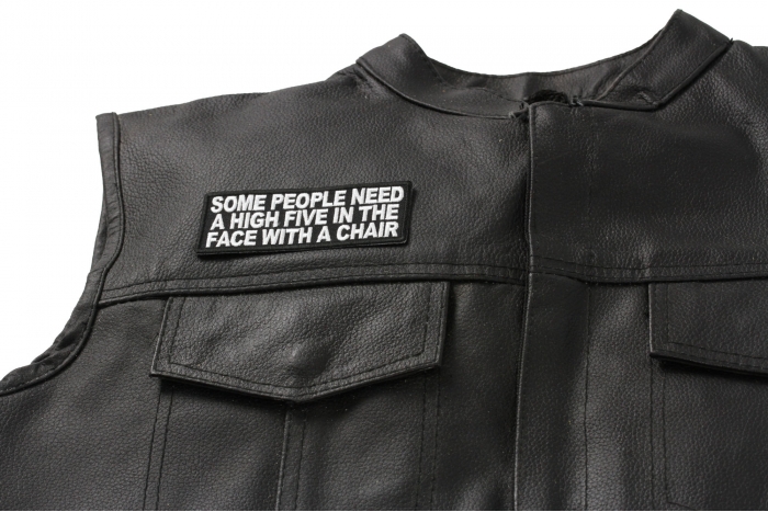 Some People Need A High Five Patch - 4x1.5 inch. Embroidered Iron on Patch shown on leather vest