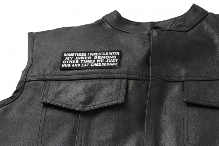 Sometimes I Wrestle With My Inner Demons Other Times We Just Hug and Eat Cheesecake Patch, Funny Saying Patches shown on leather vest