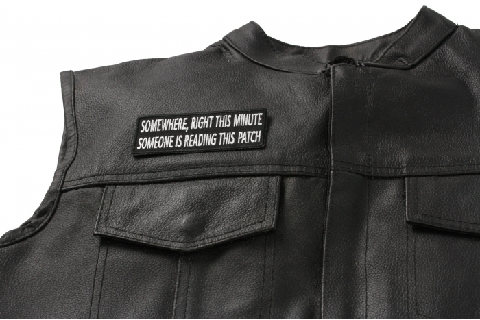 Somewhere Right This Minute Someone Is Reading This Patch - Iron on Patch - 4x1.5 inch shown on leather vest