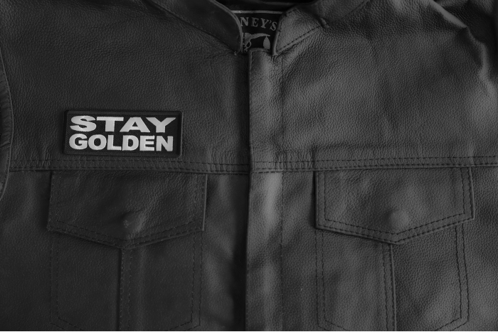 Stay Golden Patch shown on leather vest