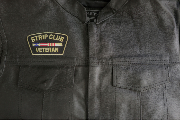 Strip Club Veteran Patch shown on leather vest