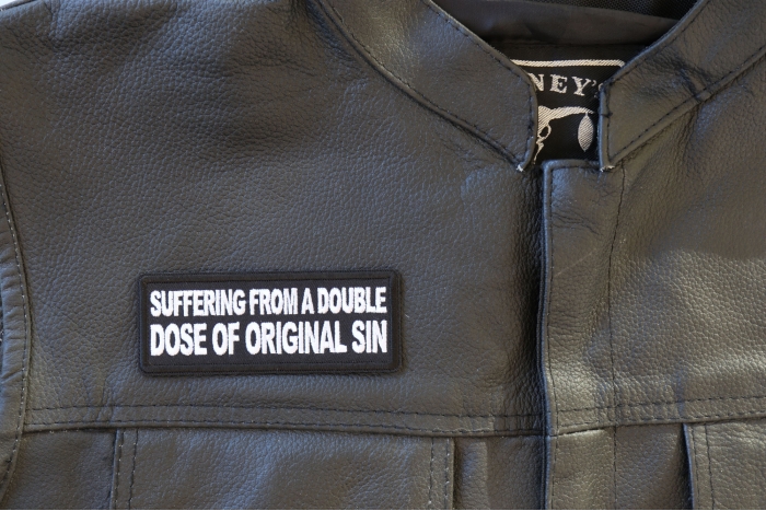 Suffering from a double dose of Original Sin Patch, Funny Saying Patches shown on leather vest