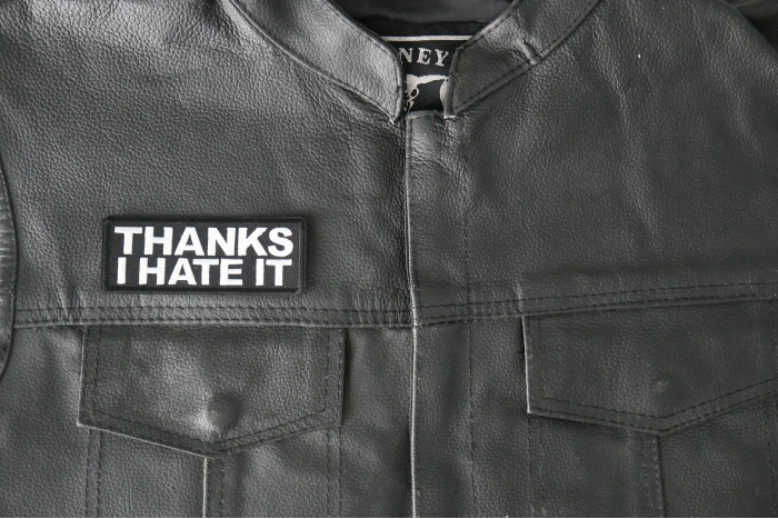 Thanks I hate it Patch - 4x1.5 inch - Embroidered Iron on Patch shown on leather vest