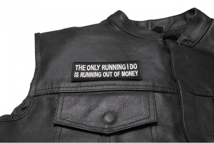 The Only Running I do is Running Out of Money Patch - 4x1.5 inch. Embroidered Iron on Patch shown on leather vest