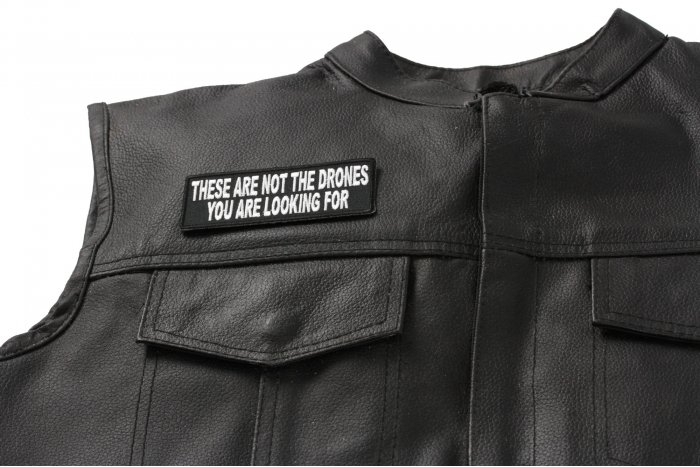 These Are Not The Drones You Are Looking For Funny Patch - 4x1.5 inch. Embroidered Iron on Patch shown on leather vest