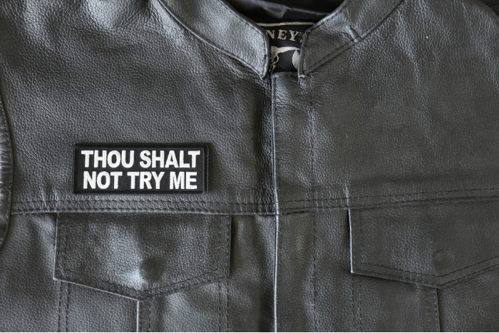 Thou Shalt Not Try Me Patch - 4x1.5 inch - Embroidered Iron on Patch shown on leather vest
