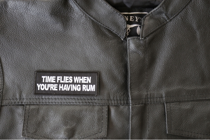 Time Flies when you are having Rum Patch - 4x1.5 inch - Embroidered Iron on Patch shown on leather vest