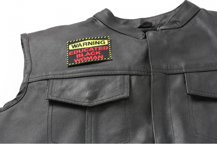 Warning Educated Black Woman Fun Patch - 3x2.5 inch. Embroidered Iron on Patch shown on leather vest
