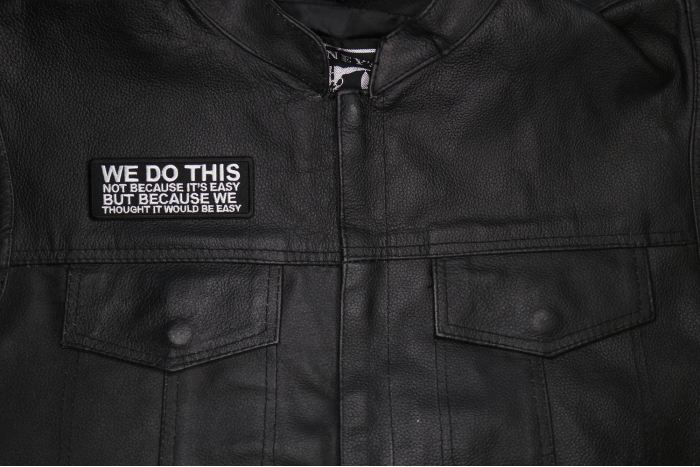 We do this not because it's easy but because we thought it would be easy patch shown on leather vest