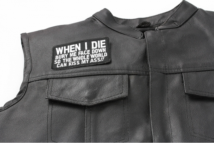When I Die Bury Me Face Down So The Whole World Can Kiss My Ass Patch - 4x2.5 inch - Embroidered Iron on Patch shown on leather vest