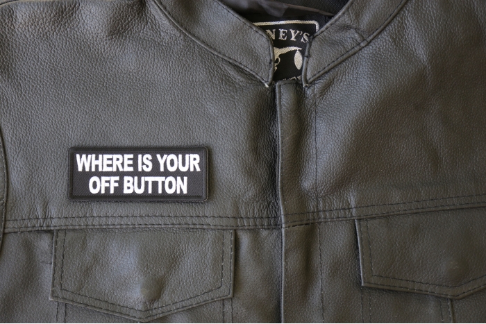 Where your Off Button Patch - 4x1.5 inch - Embroidered Iron on Patch shown on leather vest