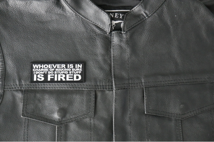 Whoever is in Charge of Making Sure I Don't Do Stupid Stuff is Fired Patch - 4x1.5 inch - Embroidered Iron on Patch shown on leather vest