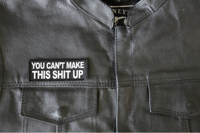 You Can't Make This Shit Up Patch - 4x1.5 inch - Embroidered Iron on Patch shown on leather vest