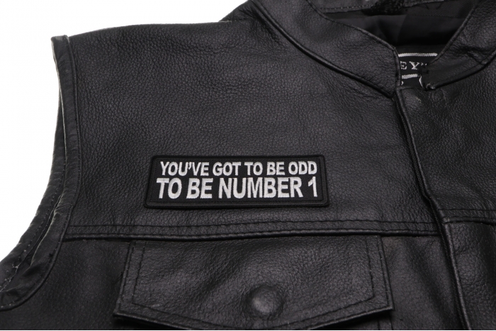 You've Got to be odd to be Number 1 Patch, Funny Saying Patches shown on leather vest