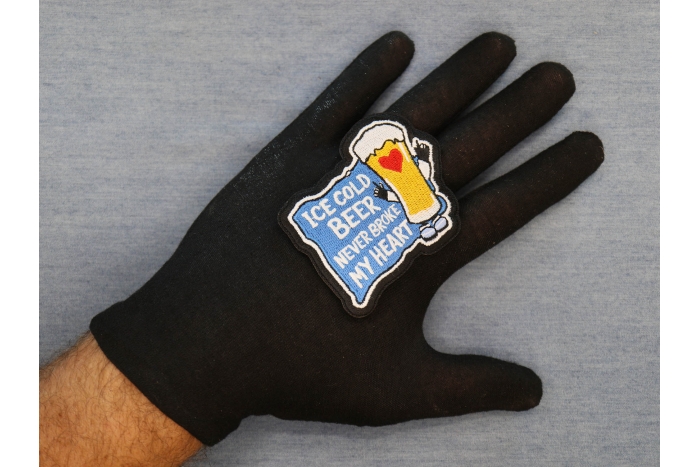 Ice Cod Beer Never Broke My Heart Patch shown on hand for size comparison