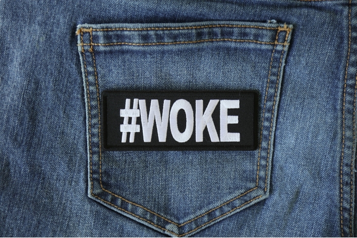 Hashtag Woke Patch shown on jeans