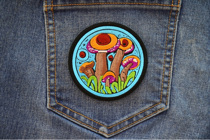 Psychedelic Shrooms Patch shown on jeans