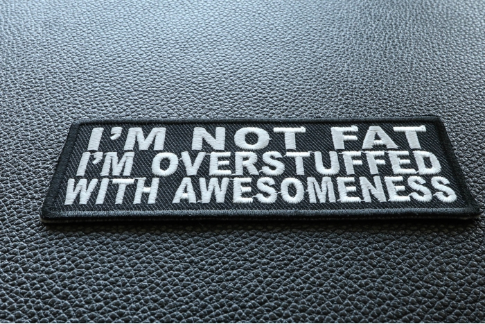 I'm Not Fat I'm Overstuffed With Awesomeness Iron on Morale Patch diagonal view