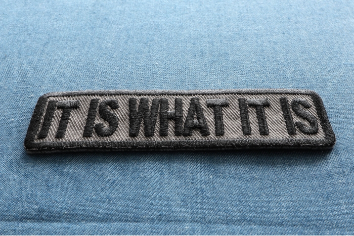 It Is What It Is Iron on Morale Patch In Gray diagonal view