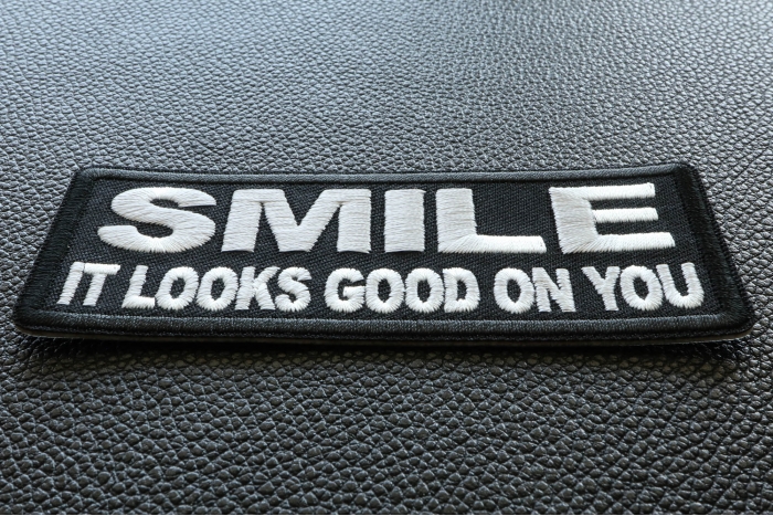 Smile It Looks Good on You Iron on Morale Patch diagonal view