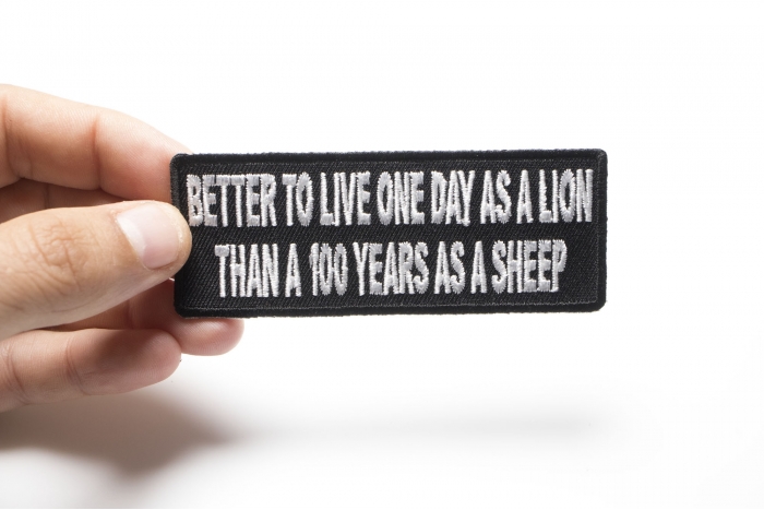 Better To Live On Day As A Lion Than A 100 Years As A Sheep Iron on Morale Patch shown on hand for size comparison