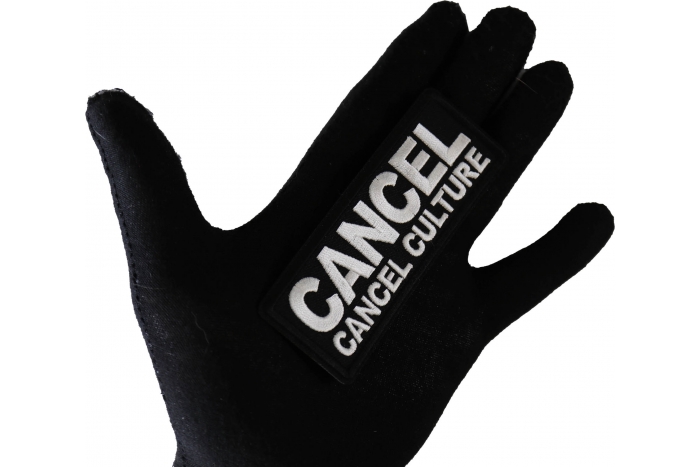 Cancel cancel Culture Patch shown on hand for size comparison